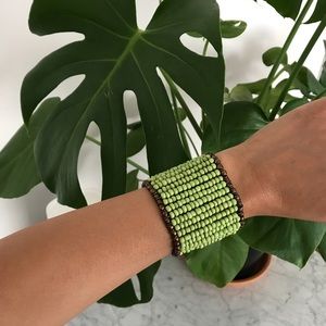 Beaded green band bracelet.